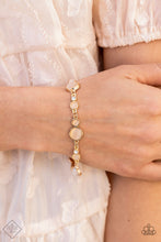 Load image into Gallery viewer, Storybook Beam - Gold - June 2021 Paparazzi Fashion Fix Bracelet
